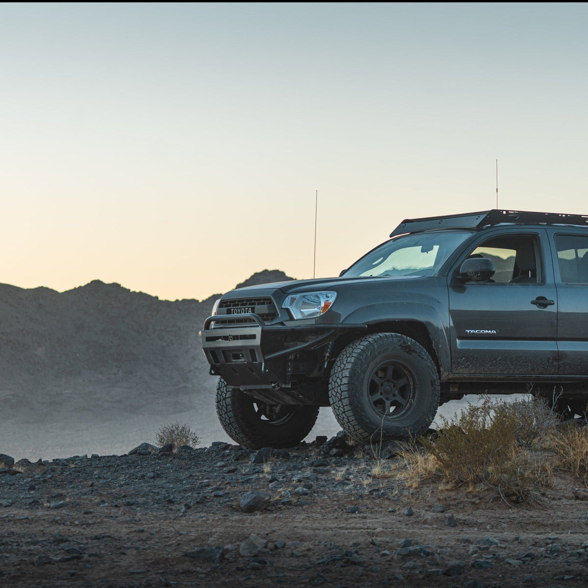 Tacoma Hybrid Front Bumper / 2nd Gen / 2012-2015 | 30" Light Bar Cutout | Mid-Height Bull Bar (Standard Width) | Raw - Unfinished