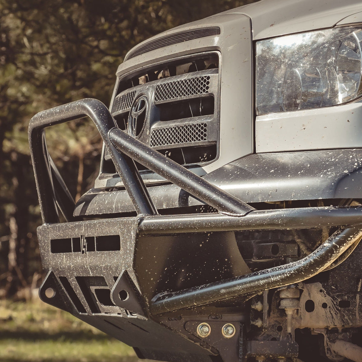 Tundra Hybrid Front Bumper / 2nd gen / 2007-2013 | Mid-Height Bull Bar | No Parking Sensors |  (Build Wider) | Raw - Unfinished