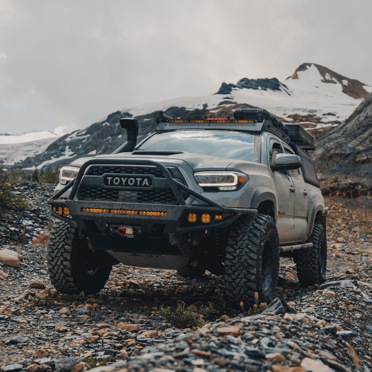 Tacoma Hybrid Front Bumper / 3rd Gen / 2016-2023 | 30" Light Bar Cutout | Mid-Height Bull Bar (Standard Width) | Hammer Black Powder Coat