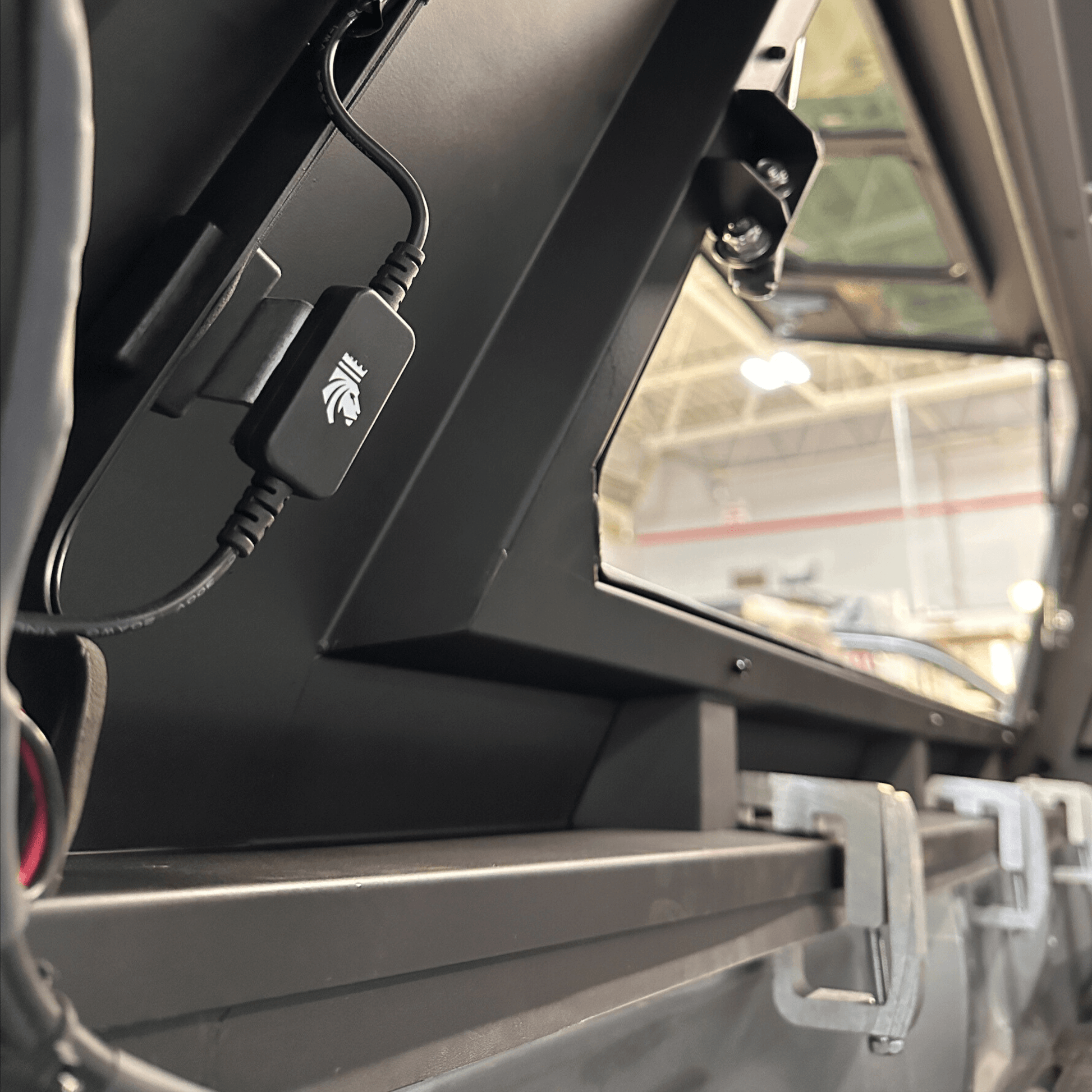Kingpin LED dimmer switch for 12-volt overland trucks and universal light applications installed on a RSI Smartcap camper shell.