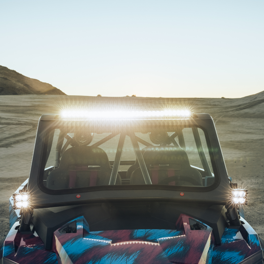 clear 30 inch led light bar mounted on a polarizs rzr