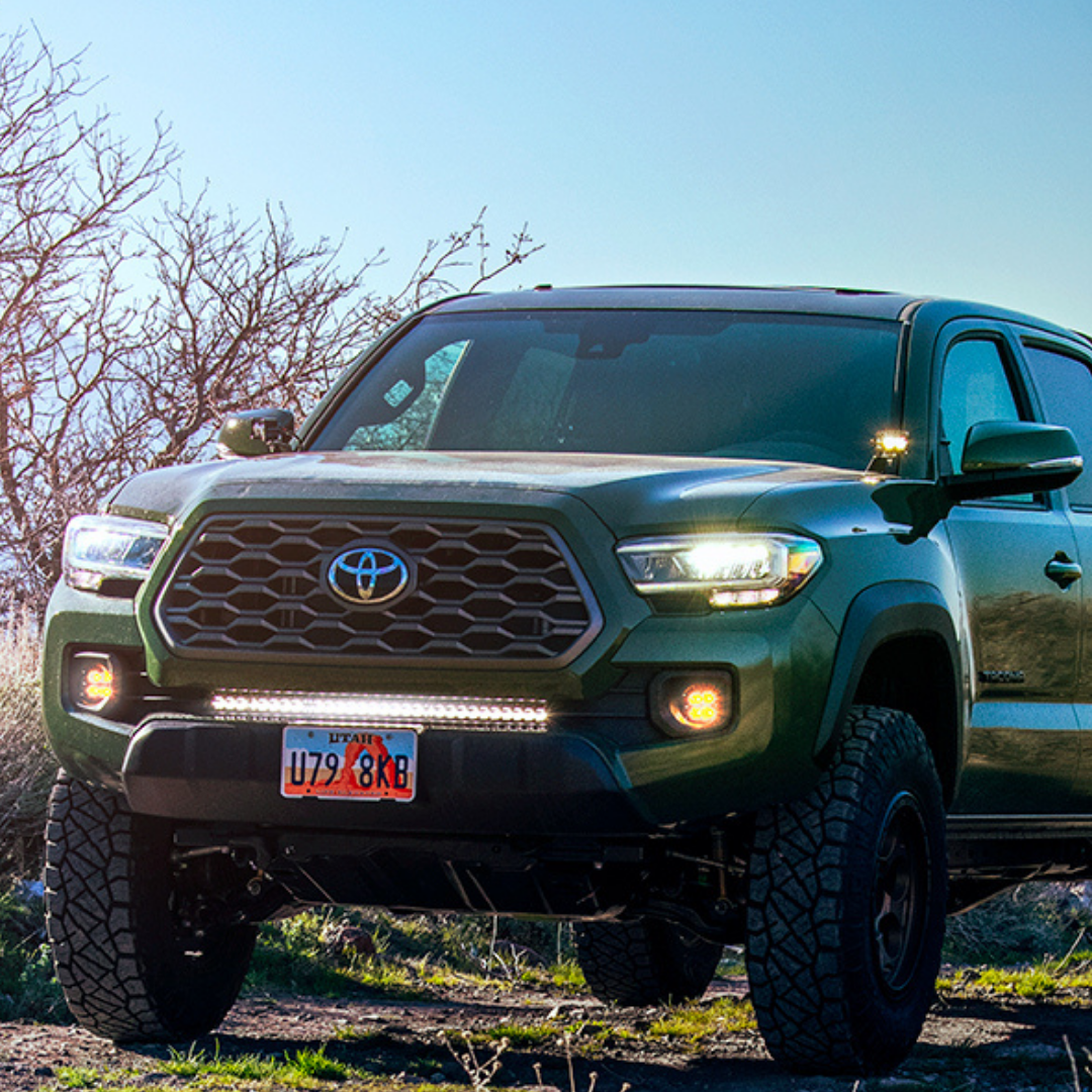 clear 30 inch led light bar mounted on a toyota tacoma